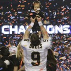 The New Orleans Saints are the unlikely winners of the Super Bowl XLIX in Miami.

Quarterback Drew Brees, pictured with his son Baylen, brought the team to a 31-17 victory.

(AP Photo/Eric Gay, File)
