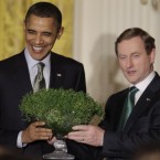 President Barack Obama receives a bowl of shamrock from Prime Minister Enda Kenny of Ireland at a St Patrick's Day celebration in the East Room of the White House in Washington. 

Obama announced that he will visit Ireland in May – and include a trip to Moneygall in Co Offaly, home of his maternal ancestors during his trip.

(AP Photo)