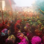 This photograph is almost like a vivid painting - it depicts Indian villagers who smeared themselves with colours to celebrate Holi festival in Nandgaon, near Mathura. (AP Photo/Pankaj Nangia)