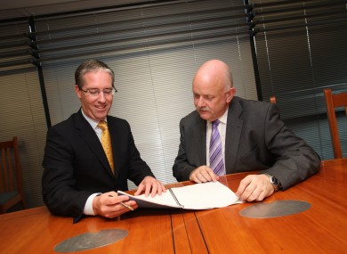 Pictured at the contract signing was Colm O'Neill, CEO BT Ireland, and Niall Barry, CIO Department of Social Protection.