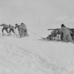 Pulling and pushing: the team at work moving supplies over the snow. (Courtesy of Scott Polar Research Institute, University of Cambridge)