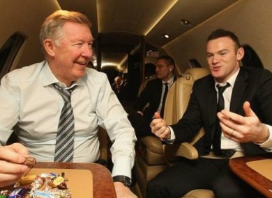 Celebrations: Fergie and Rooney share a box of sweets.