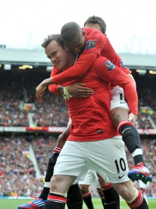 Wayne Rooney celebrates Manchester United's controversial opener
