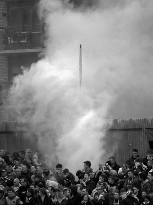 A flare goes off at Inchicore last Friday night in the Pat's-Hoops game.
