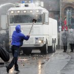 Police deploy the water canon to disperse protesters (Photo: Laura Hutton/Photocall Ireland)