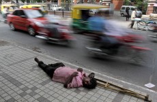 Percentage living below the poverty line falls globally