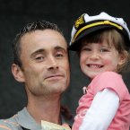 Pictured (LtoR) Noel Byrne and Eli Mac Donald Byrne (4) enjoy events in Grand Canal Square for the Tall Ships Festival 2012. Photo: Sam Boal/Photocall Ireland