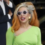 Big hair, big glasses, bright dress and bulging bank account - that's our Lady Gaga, who was paid million last year.
(AP Photo/Wally Santana, File)