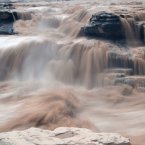Water roars down the Hukou Waterfall of the Yellow River on August 11, 2012 in Linfen, Shanxi Province of China. (Photo by Lv Jianping/ChinaFotoPress)
