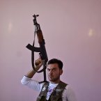 Twenty-two-year-old Mohammed Sami was a barber before joining rebel forces to fight against Bashar Assad's regime. (AP Photo/Muhammed Muheisen)
