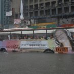 A bus negotiates a flooded road in Manila.
(AP Photo/Ezra Acayan)