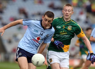 Cormac Costello of Dublin with Brian Power of Meath during their All-Ireland Minor Football Final clash.