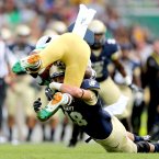 Keegan Wetzel tackles Cierre Wood. ©INPHO/James Crombie