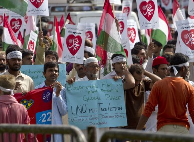Supporters of Pakistani religious group Tehreek-e-Minhaj-ul-Qaran participate in a demonstration against the film yesterday