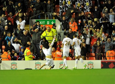 Swansea City's Chico (left) celebrates.