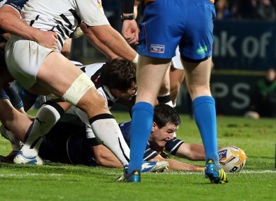 Jonathan Sexton dives over for a try.