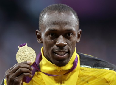 Bolt is pictured after winning gold in the 100m final.