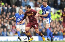 Fan tries to warm up with Manchester City stars at Everton