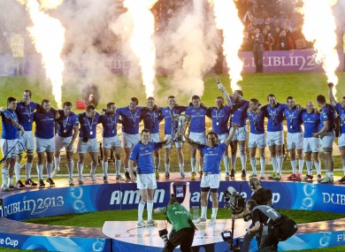 Jonny Sexton and Isa Nacewa lift the trophy.