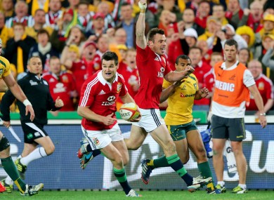 Jonathan Sexton races through for the Lions' second try.