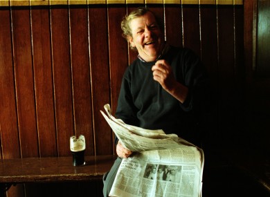 Portrait of the man enjoying a pint in his local in 1999