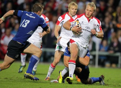 Ulster's Luke Marshall drives forward.