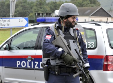 Police officer stands at the scene near Grosspriel in Austria.