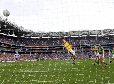 Kerry's goalkeeper Brendan Kealy looks on as Dublin's Kevin McManamon shot crosses the line for Dublin's second goal.