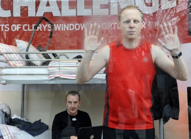 Kennedy (background) and Dixon at a charity broadcast