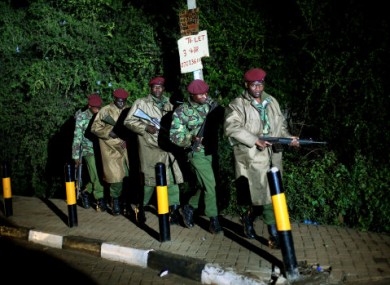 Kenyan Defense Forces leave the near vicinity of the Westgate Mall in Nairobi tonight