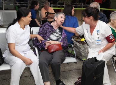 Nurses Daisy George and Deirdre Forsyth with pilgrim Mary Swan. (Image: John McElroy)