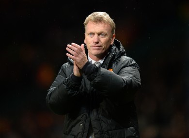 Manchester United's manager David Moyes applauds the Bayer Leverkusen game.