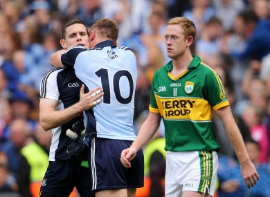 Highs and lows: Stephen Cluxton and Paul Flynn celebrate while Colm Cooper reflects on defeat.