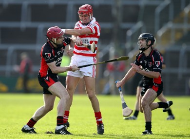 Oulart-The Ballagh's Paul Roche with Paul Morris of Ferns St Aidan's.