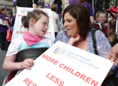Lorraine Dempsey and her daughter Rianna (10) from Wicklow protest outside Leinster House last June.