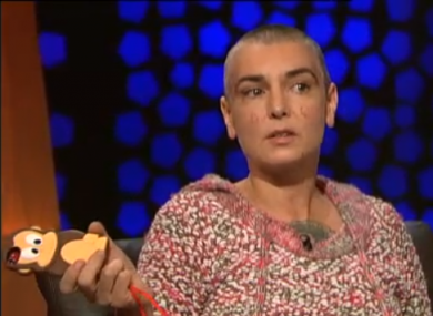 Sinéad O'Connor and her monkey-encased iPhone.