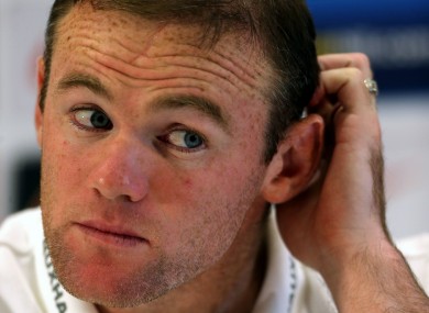 England's Wayne Rooney speaks to the media today.